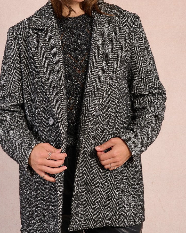Veste à chevrons noir et blanc